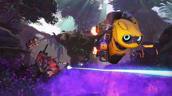 Crucible screenshot showing a robot, a person, a small furry thing and a hulking monster in one of the team-based shooter's forested environments