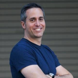 Headshot of Wizards of the Coast head of digital product development Dan Ayoub